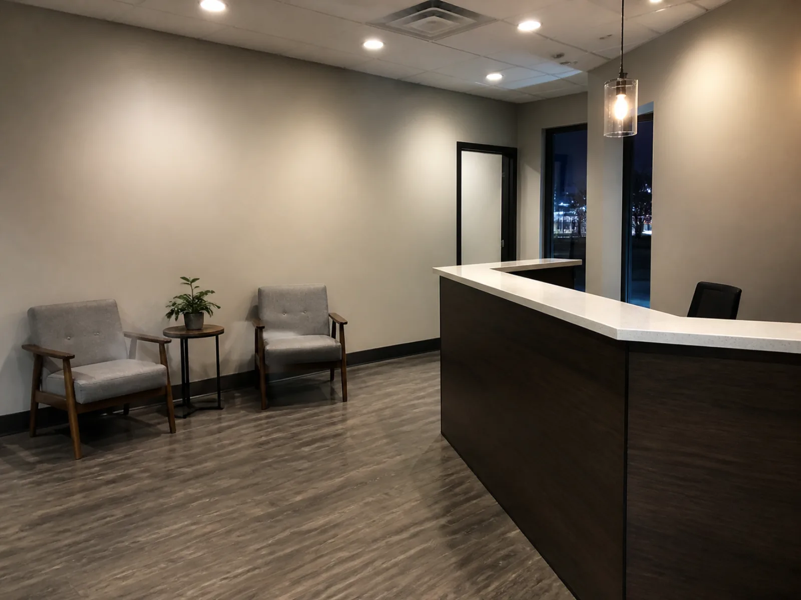 Business reception area with waiting chairs and a service counter after cleaning