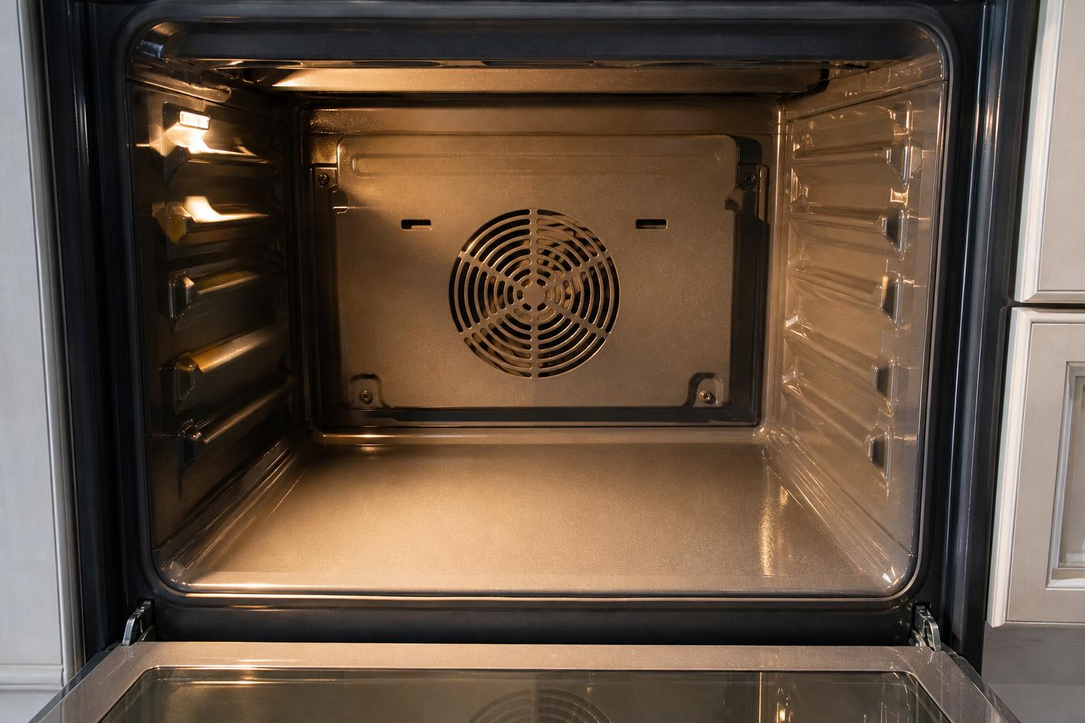 Detailed deep cleaning of kitchen appliance interior